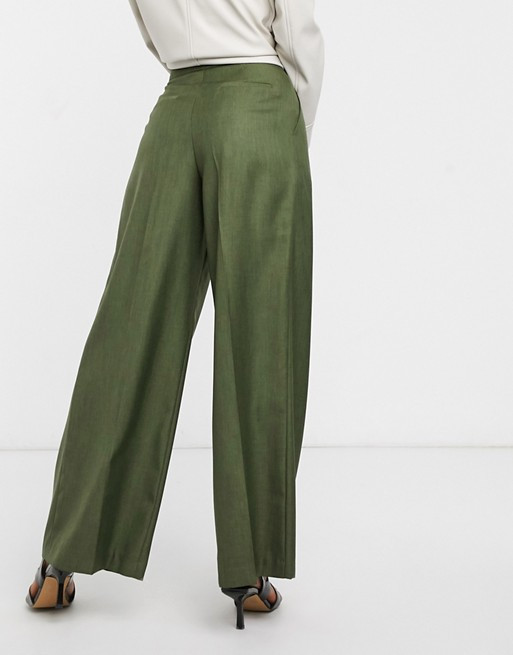 Elegantne zelene nohavice